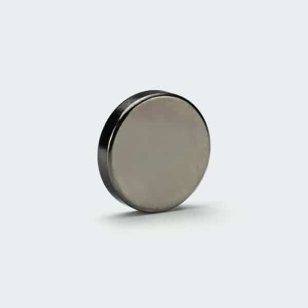 A round NdFeB magnet with smooth black nickel plating surface treatment.