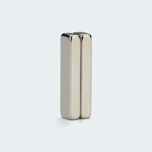 Two rectangular strongest NdFeB magnets with silver nickel plating, vertically stacked together.