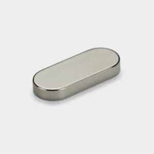 An oval strong block magnet with round corners for both short sides, and glossy nickel plating surface treatment.