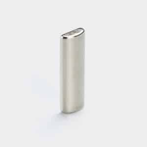 A half-round strong rod magnet with silver plating finish, vertically placed on a white desktop.