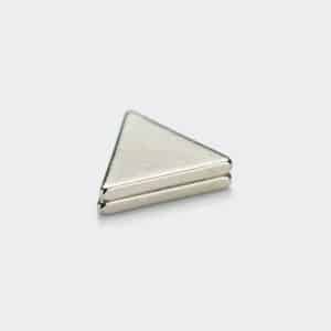 A stack of two triangular strong magnets with silver nickel plating surface treatment, laid flat on a white desktop.