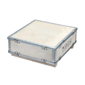 Magnetic chuck shipping crate with steel-reinforced plywood panels, metal corner brackets, and pallet base for secure freight transport.